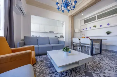 a living room with a couch and a table at Apartment Ruzafa 4 bedroom in Valencia