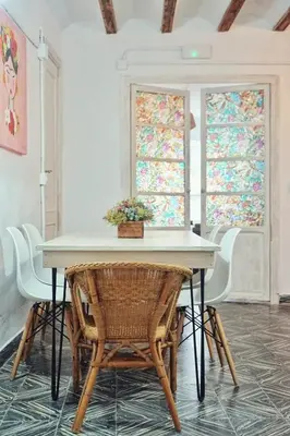 a dining room with a table and chairs at Casa Maibeca in Bolbaite