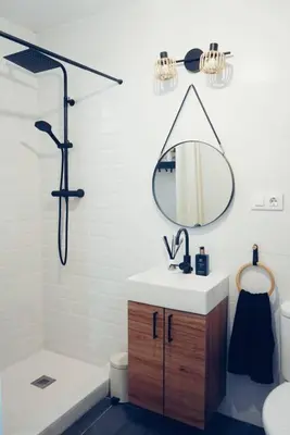 a bathroom with a sink and a mirror at Casa Maibeca in Bolbaite