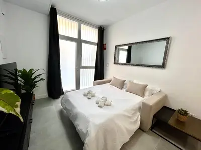 a bedroom with a bed with two teddy bears on it at Valencia Comfort Stay Near Metro, 2 Bed, 1 Bath in Valencia