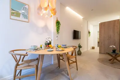 a dining room with a table and chairs at PA20A - Loft Valencia in Valencia