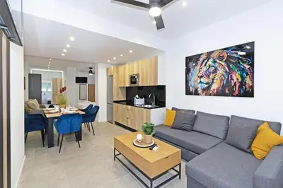 a living room with a couch and a table at GuestReady - A lovely studio in la Saidia Valencia in Valencia