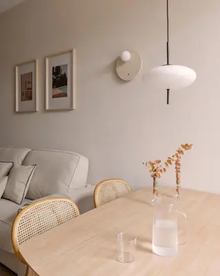a dining room table with chairs and a couch at MH Apartments Central Valencia in Valencia