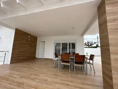 a dining room with a table and chairs at La Casita in La Eliana