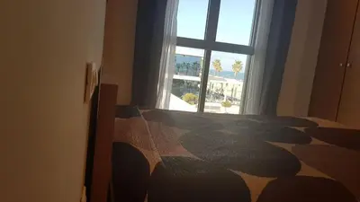 a bedroom with a bed and a window at Direct view to the beach , Parking , Terraza in Valencia