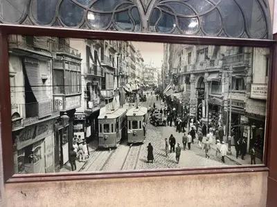 a black and white photo of a city street with trams at Valencia Aparthotel HBB in Valencia