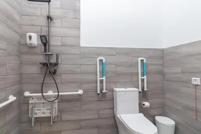 a bathroom with a toilet and a shower at Moreno Rooms by BET Apartments in Valencia