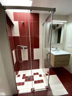 a bathroom with a shower and a sink at Encanto Rural en Requena in Requena