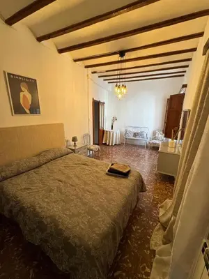 a bedroom with a bed in a room at La Replaceta in Segorbe