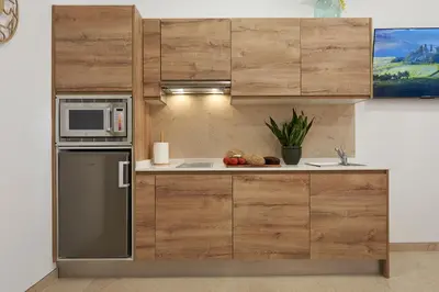 a kitchen with a refrigerator and a microwave at Loft 9B JAIME II in Valencia