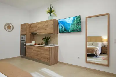 a kitchen with a sink and a mirror in a room at Loft 9B JAIME II in Valencia