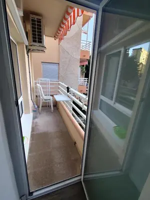 a view of a balcony from the inside of a house at Precioso estudio en la playa norte de Valencia in Puebla de Farnals