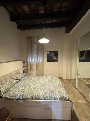 a bedroom with a large bed in a room at Miguelete tower & 4th FLOOR & City center and no elevator in Valencia