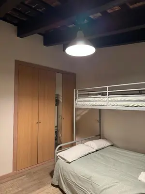 a bedroom with a bunk bed and a cabinet at Miguelete tower & 4th FLOOR & City center and no elevator in Valencia