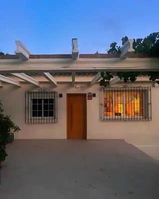 a building with a door and a window at Casa Roka in Alberique