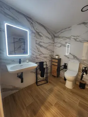 a bathroom with a sink and a toilet at kala-mar Valencia in Valencia