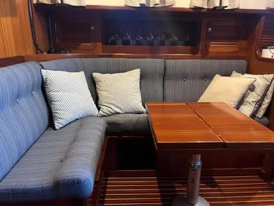 a couch with pillows and a wooden table at Xanquete in Valencia