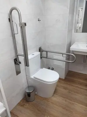 a bathroom with a toilet and a sink at District Key - Valencia, Plaza del Cedro in Valencia