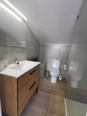 a bathroom with a sink and a toilet at More then a loft in Godella