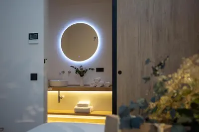 a bathroom with a sink and a mirror at Nomad Haux Mestalla Apartments in Valencia