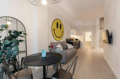 a living room with a couch and a table at Chic & Cozy Stay in Valencia in Valencia