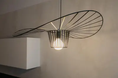 a ceiling light hanging from a wall at Trendy Retreat in Valencia in Valencia
