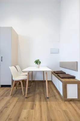 a dining room with a table and two chairs at Les Arts Plaza by Concept Flats in Valencia
