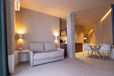 a living room with a couch and a table at Abastos by Concept Flats in Valencia