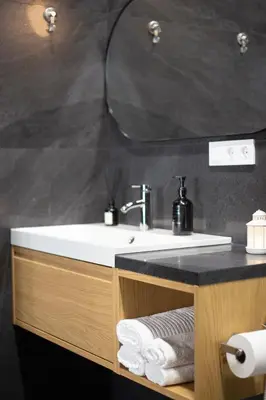 a bathroom with a sink and a mirror at New Loft Rusafa in Valencia