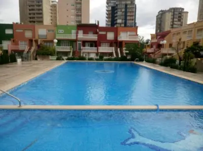 a large blue swimming pool with a shark painted on it at Casa con Barbacoa en Urbanización Privada in Valencia