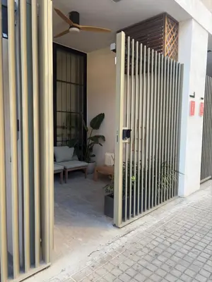 an open gate to a house with a patio at Mestalla flats & Rut in Valencia
