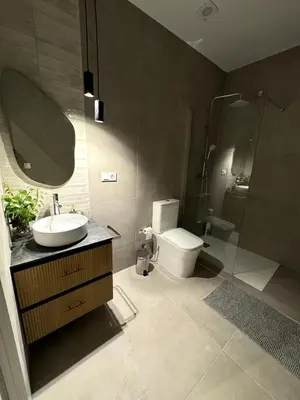 a bathroom with a sink and a toilet and a shower at Cozy apartment Valencia in Valencia