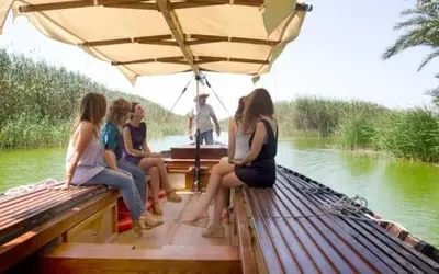 a group of people on a boat on a body of water at Dúplex-Lofts Les Arts i Les Ciències in Valencia