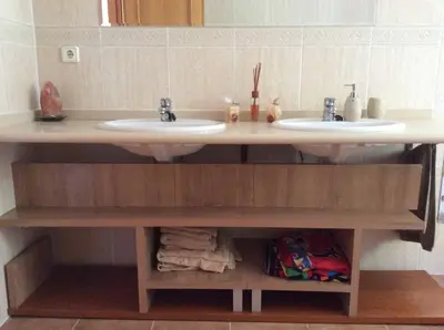 a bathroom with two sinks on a wooden vanity at Valencia, villa, piscina privada, junto A-7 cerca de playas, aeropuerto, Cheste in Torrent