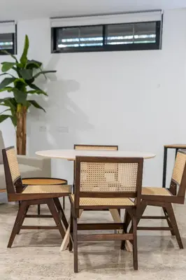 a table with two chairs and a table and a table and chairs at VLC Host - Tamarit in Valencia