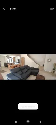a picture of a living room with a couch at Casa con piscina junto al mar in El Perellonet