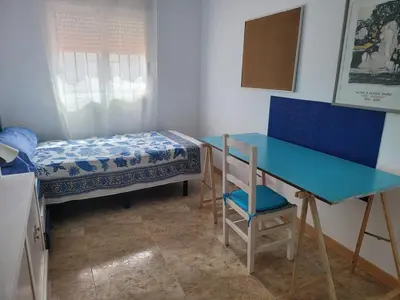 a bathroom with a sink and a toilet at Patriarch's Alfara Room in Alfara del Patriarca