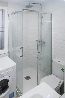 a bathroom with a shower with a toilet and a sink at Colomer Silence in Valencia