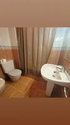 an empty hallway with a white door and a phone at Room with private bathroom in Alfara del Patriarca