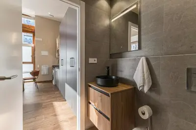 a bathroom with a sink and a mirror at Suite Premium junto al Río Turia 1 in Valencia