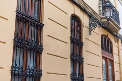 a building with balconies on the side of it at Suite Premium junto al Río Turia 2 in Valencia