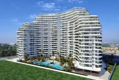 a rendering of a large white apartment building at Appartement avec vue piscine in Canet de Berenguer