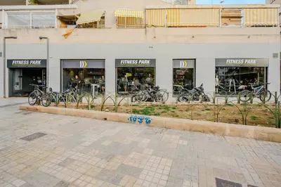 a bunch of bikes parked in front of a store at Cabanal Beach House - 10 min to ocean , FastWifi , SmartTV, AC in Valencia