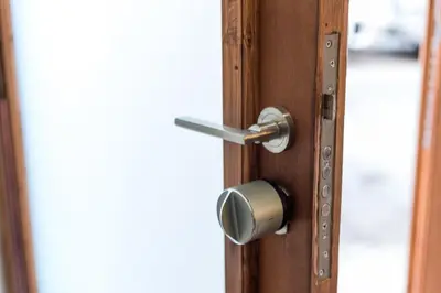 a wooden door with a metal door knob at Premium Suite by the Turia River 3 in Valencia