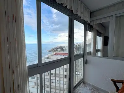 a view of the ocean from a room with windows at Relax & Sea View & Beach Access in Faro de Cullera