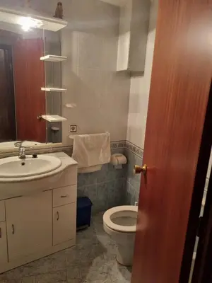 a bathroom with a sink and a toilet at Casa Amando in Chulilla