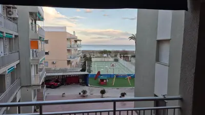 a view of a tennis court from a balcony at CANET de BERENGUER in Canet de Berenguer
