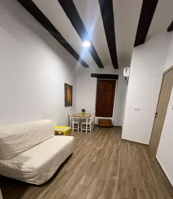 a room with a flat screen tv on a wall at Piso 2 - Apartamento Mercado Central in Valencia