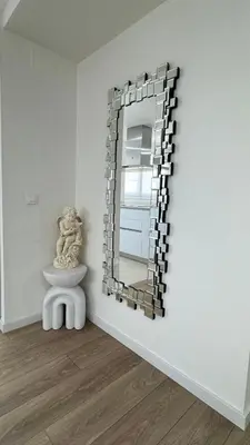 a mirror on a wall next to a toilet in a room at Apartamento Luxury in Valencia