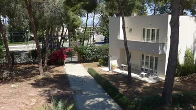 an aerial view of a white house with trees at Casa Kiosko 2 bedroom chalet with swimming pool in La Eliana